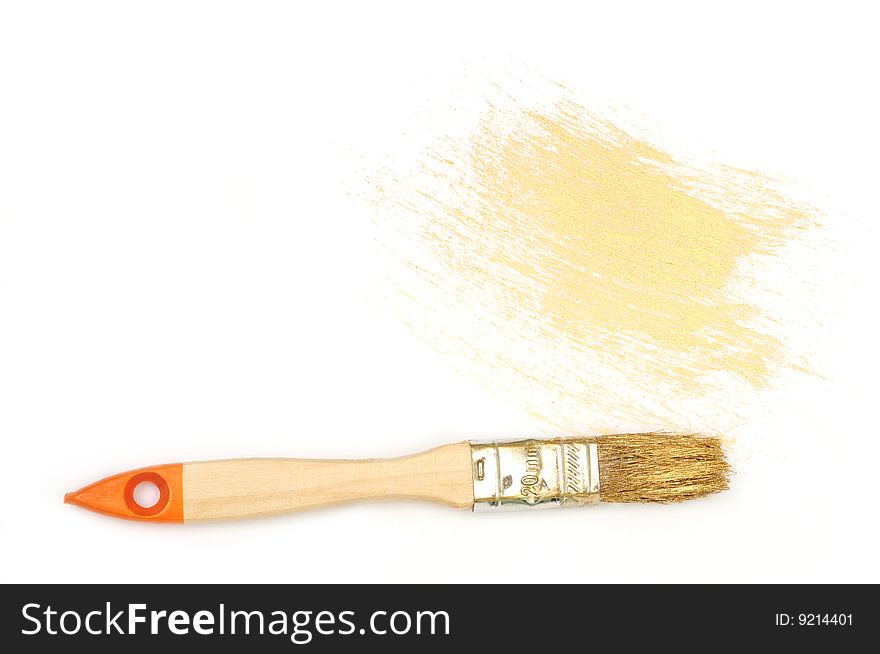 Drawdown of gold paint and brush on the white background. Drawdown of gold paint and brush on the white background