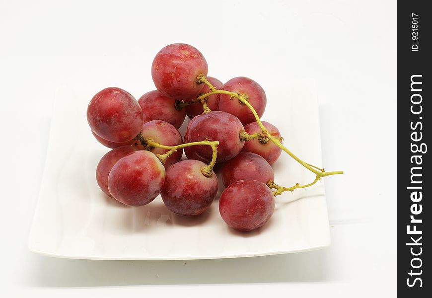 Grapes isolated on the white background.