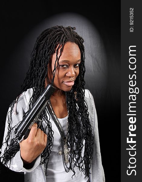 Afro american girl with gun. Afro american girl with gun
