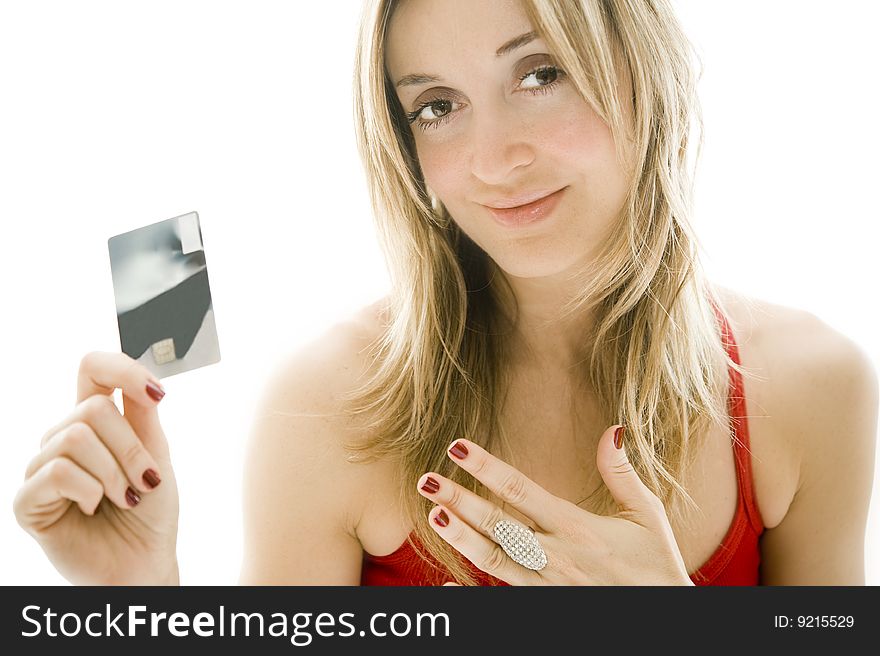 Credit card and jewellery, white background
