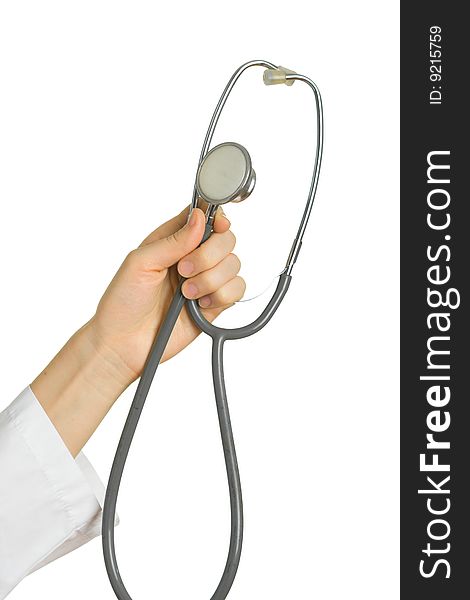 Stethoscope in his hand the doctor on a white background