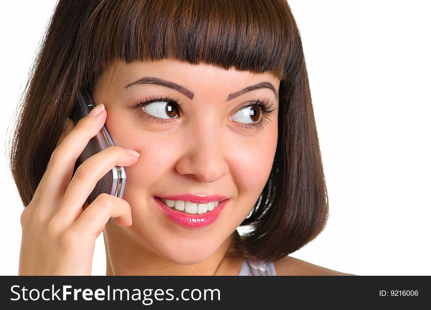 Woman calls on a cellular phone and smiling