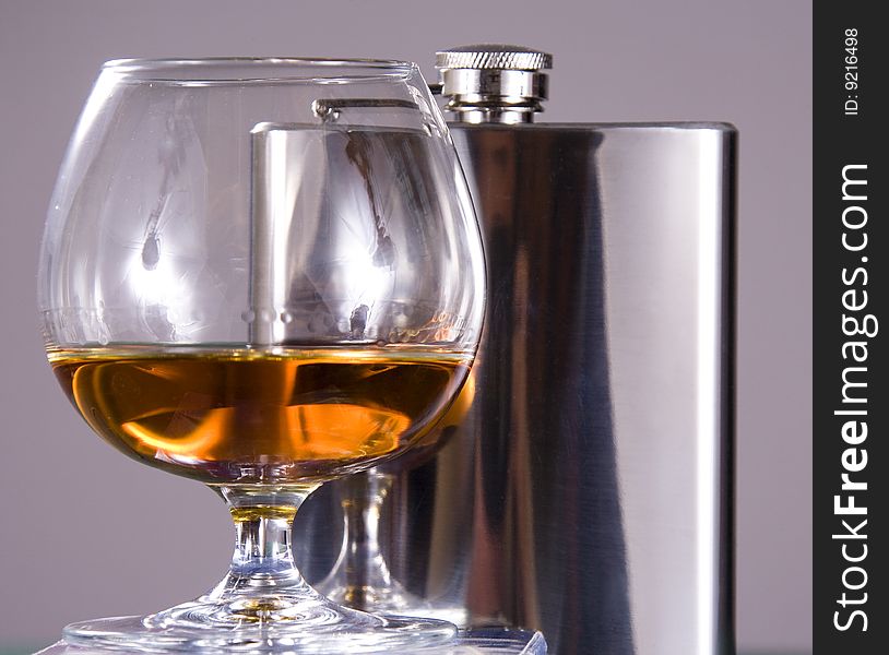 Still life: Cognac and flask