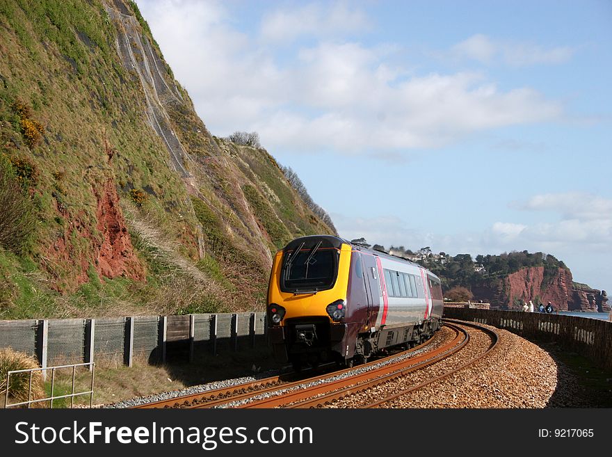 Train on coastal railway track