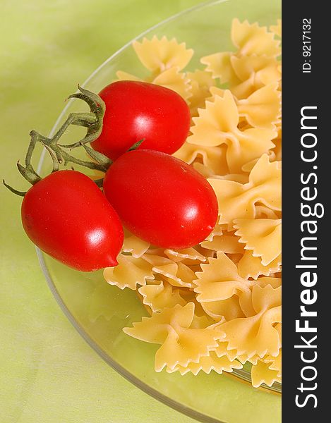 Butterfly raw  pasta and tomato