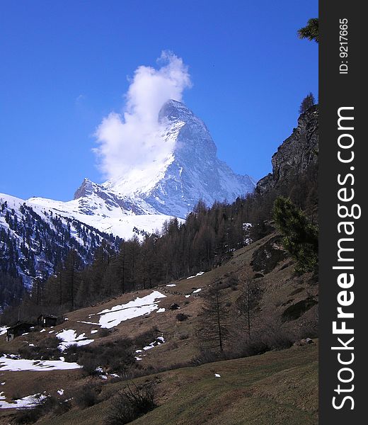 View of the matterhorn ridge with a cloud