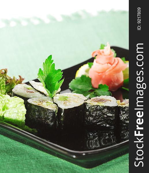 Japanese Cuisine - Sushi with Salad Leaf and Parsley