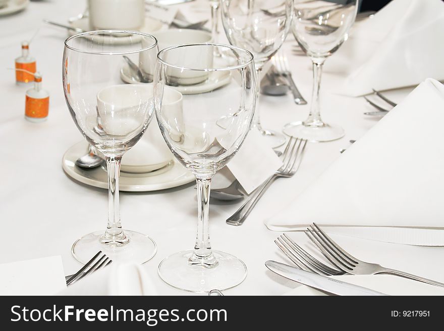 Festive dinner arrangement with glasses and cutlery