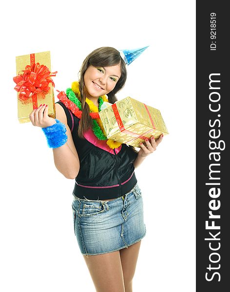 Happy young beautiful girl with a present in her hands celebrating her birthday. Happy young beautiful girl with a present in her hands celebrating her birthday