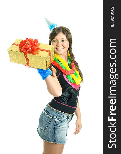 Happy young beautiful girl carrying a birthday present in her hands. Happy young beautiful girl carrying a birthday present in her hands