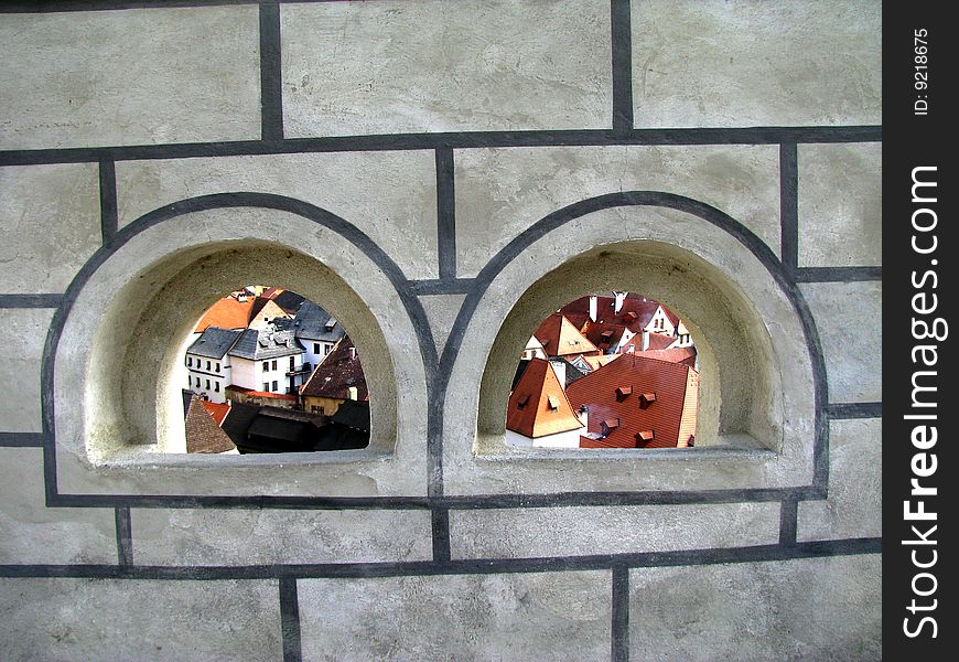 View through windows in castle wall at the old town Krumlov in Czech Republic. View through windows in castle wall at the old town Krumlov in Czech Republic