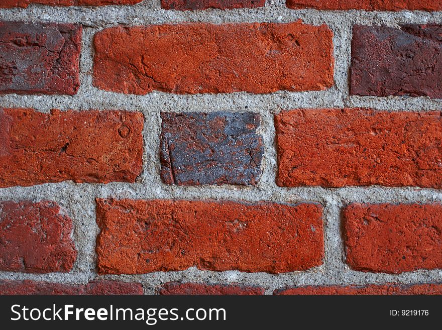 A old, red brick wall. A old, red brick wall