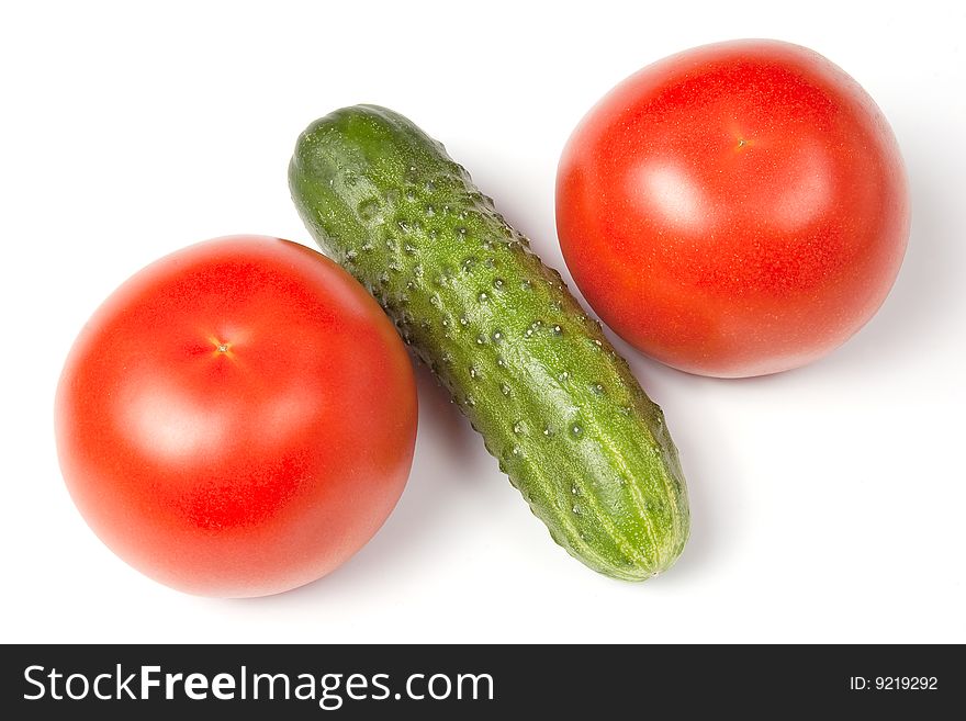 Cucumbers and tomatoes in funny vagetable percent, isolated on white background