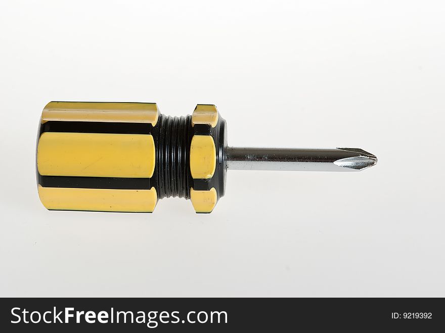 Screwdriver, small tools in white background