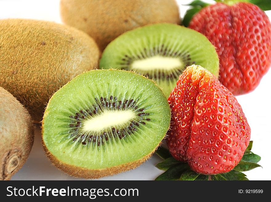 Kiwi and strawberry on the table. Kiwi and strawberry on the table.