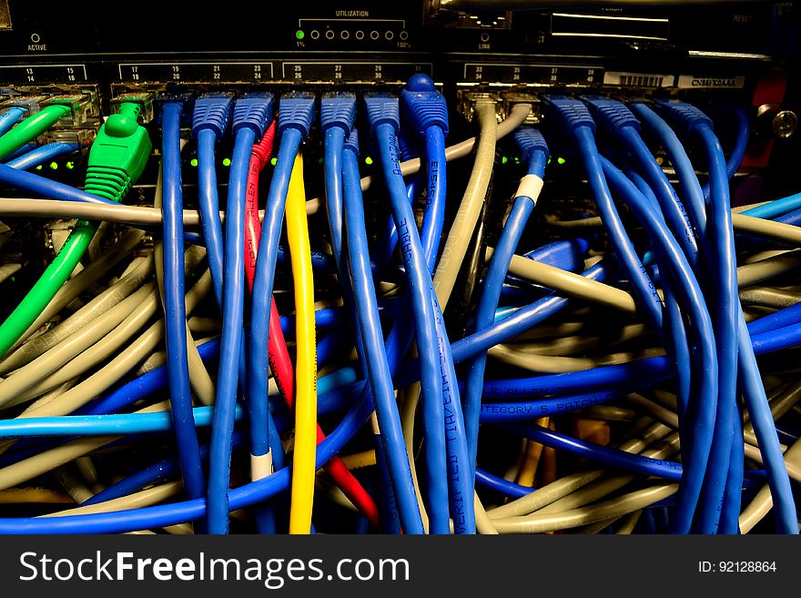 1GbE switch & colorful ethernet cables. 1GbE switch & colorful ethernet cables.
