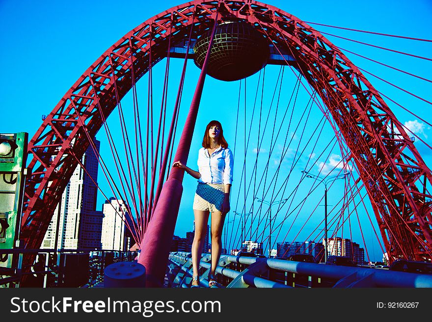 Abstract advertising illustration of young woman and circus wheel in Moscow, Russia. Abstract advertising illustration of young woman and circus wheel in Moscow, Russia.