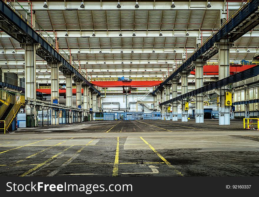 A view inside an empty warehouse or manufacturing building.