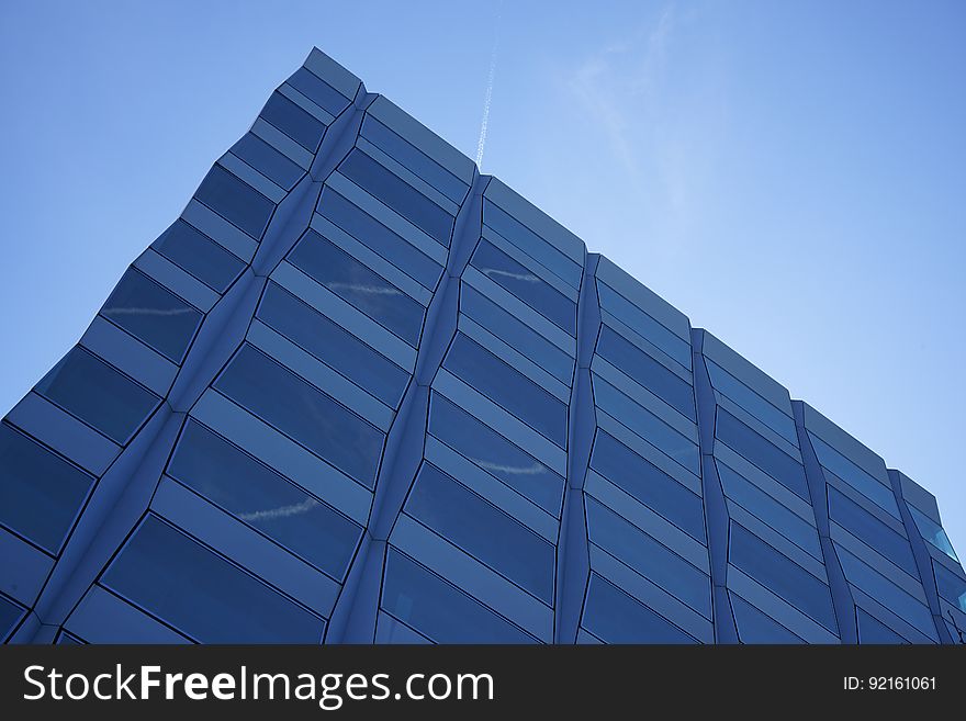 Corner of modern building in blue skies