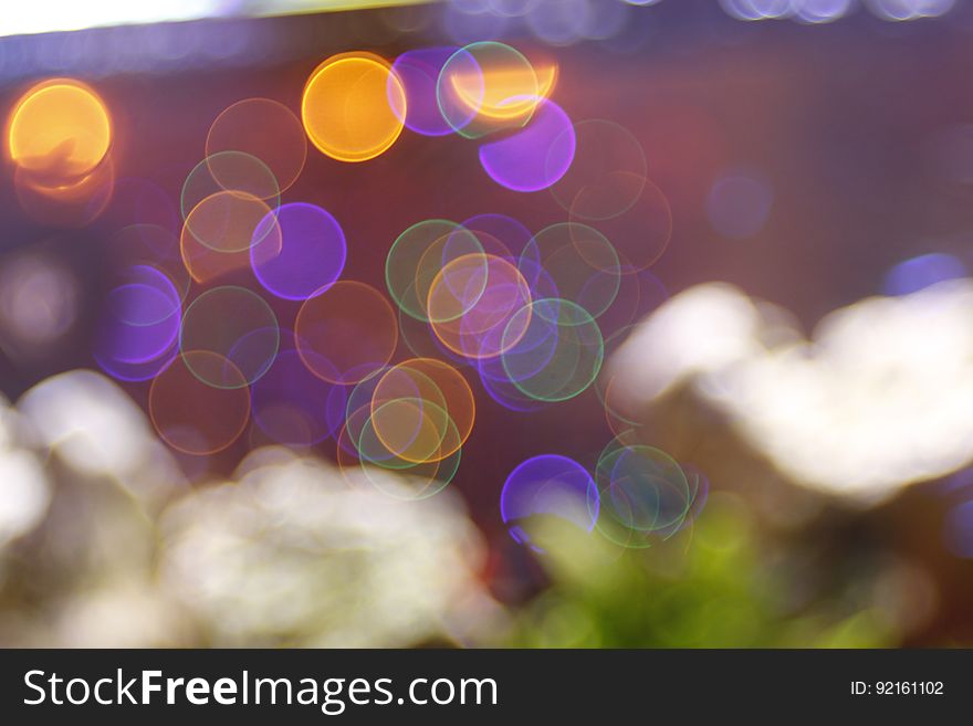 A blurred background with bokeh lights. A blurred background with bokeh lights.