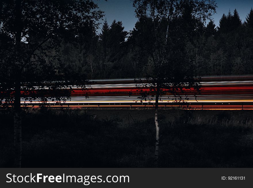 Light Streaks On Highway At Night