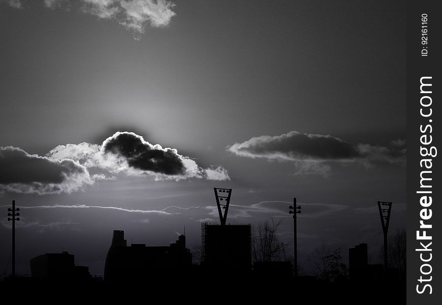 The silhouettes of buildings against the sky in black and white. The silhouettes of buildings against the sky in black and white.
