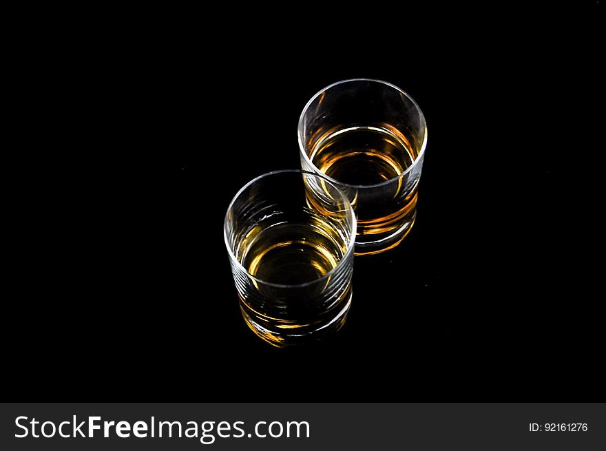 Glasses Of Alcohol On Black