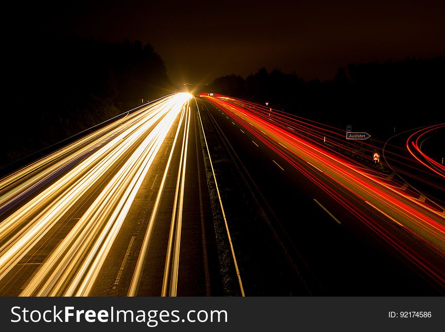 Speeding Car on High Way during Night Time