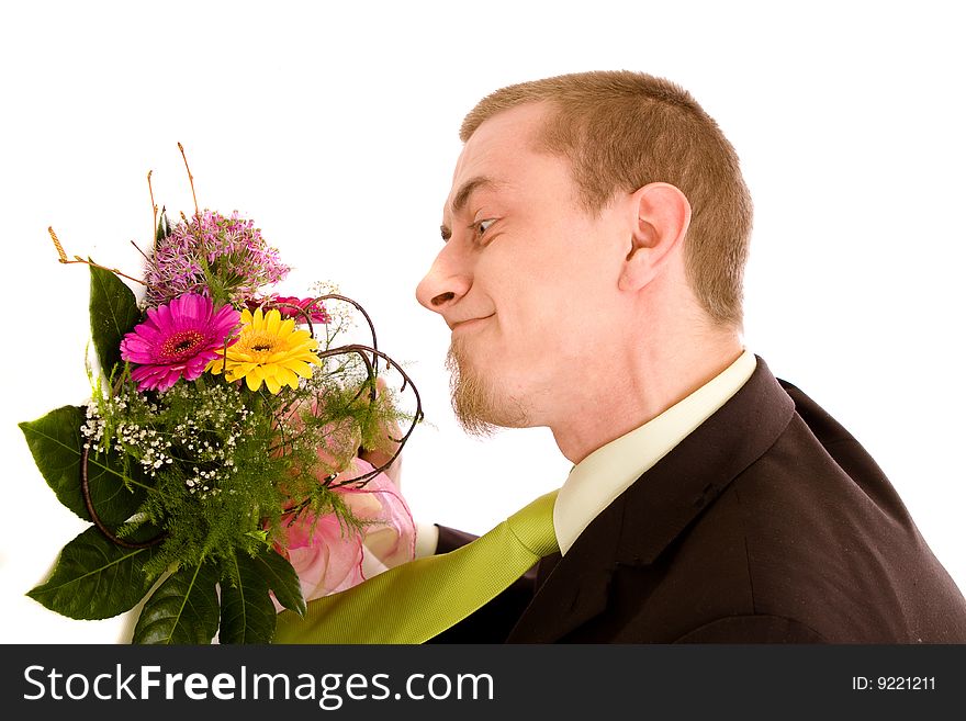 Man with flowers on white
