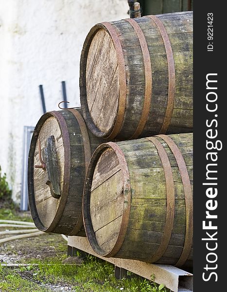 Old oak wine barrels on a mediterranean setting