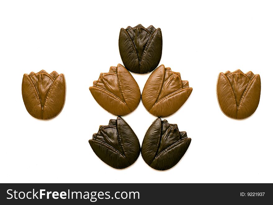 These are flower shaped chocolates from milk and dark chocolate. These are flower shaped chocolates from milk and dark chocolate.