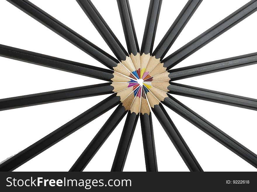 Colored pencils in a circle isolated on white background. Colored pencils in a circle isolated on white background