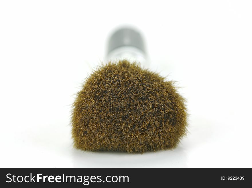 Makeup brushes isolated against a white background