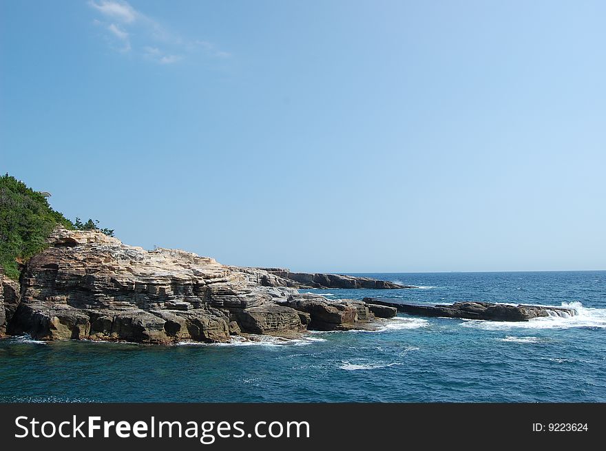 A rocky coast view from Shirahama in Wakayama prefecture in Japan. Just 2.5 hours from Osaka. A rocky coast view from Shirahama in Wakayama prefecture in Japan. Just 2.5 hours from Osaka.