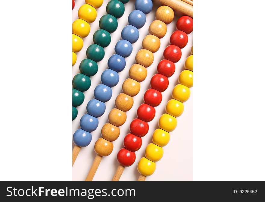 Isolated wooden abacus on a white background. Isolated wooden abacus on a white background