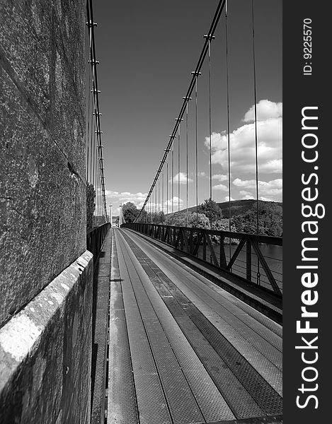 A long bridge across the river Lot in southern France