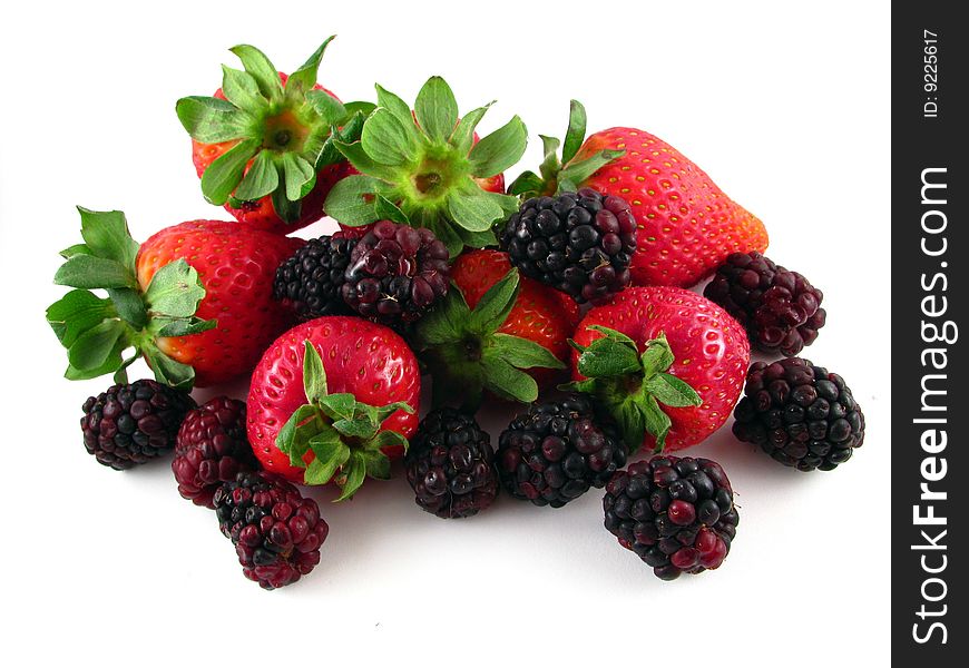 An arrangement of strawberries and blackberries on a white background. An arrangement of strawberries and blackberries on a white background