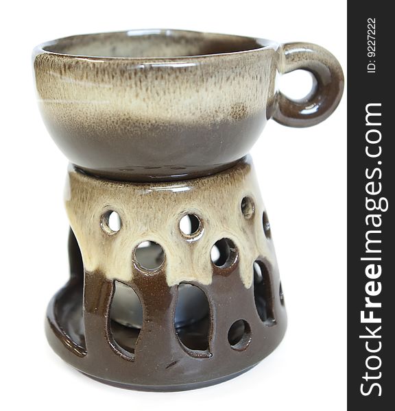 Ceramic candlestick for heating in a cup of drinks for relaxation