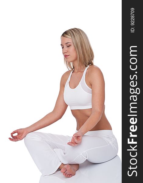 Young woman in yoga position on white background. Young woman in yoga position on white background