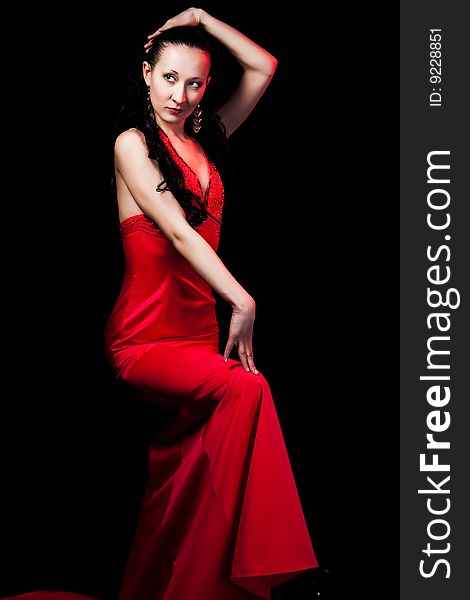 Young woman in red evening dress. Young woman in red evening dress