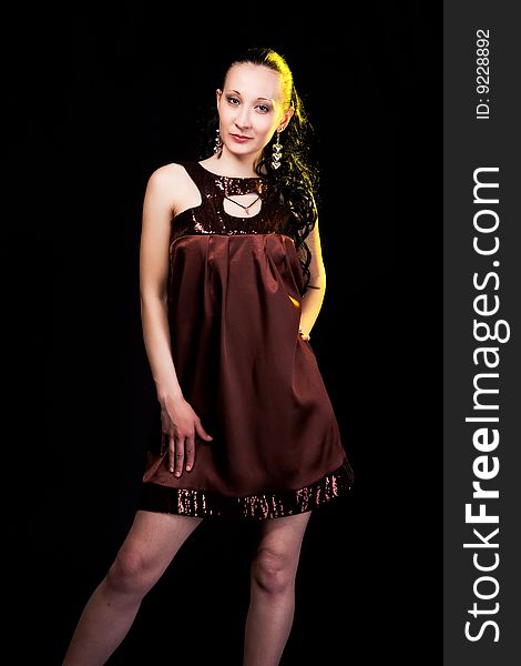 Pretty stylish woman in brown evening dress. Pretty stylish woman in brown evening dress