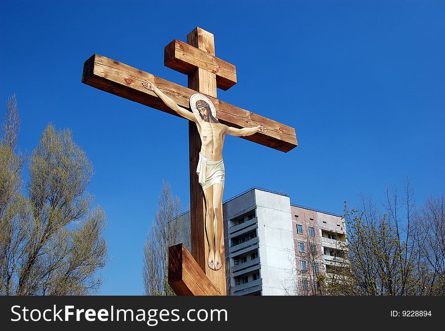 Chernobyl area.Cross in memory of city. Lost city Pripyat. Modern ruins. Ukraine. Kiev region.