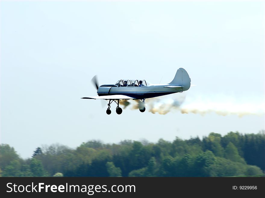 A stunt pilot plane during a flight show.