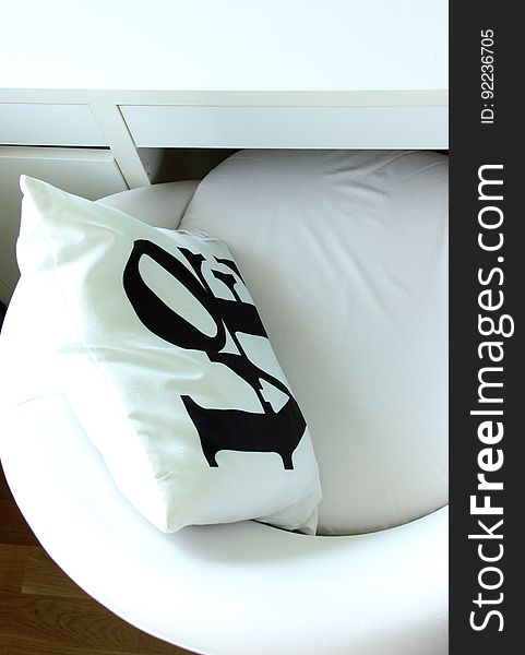 LOVE Pillow On White Chair