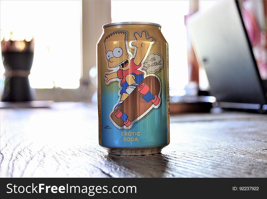 Closeup of a pop can with Bart Simpson on it. Closeup of a pop can with Bart Simpson on it.