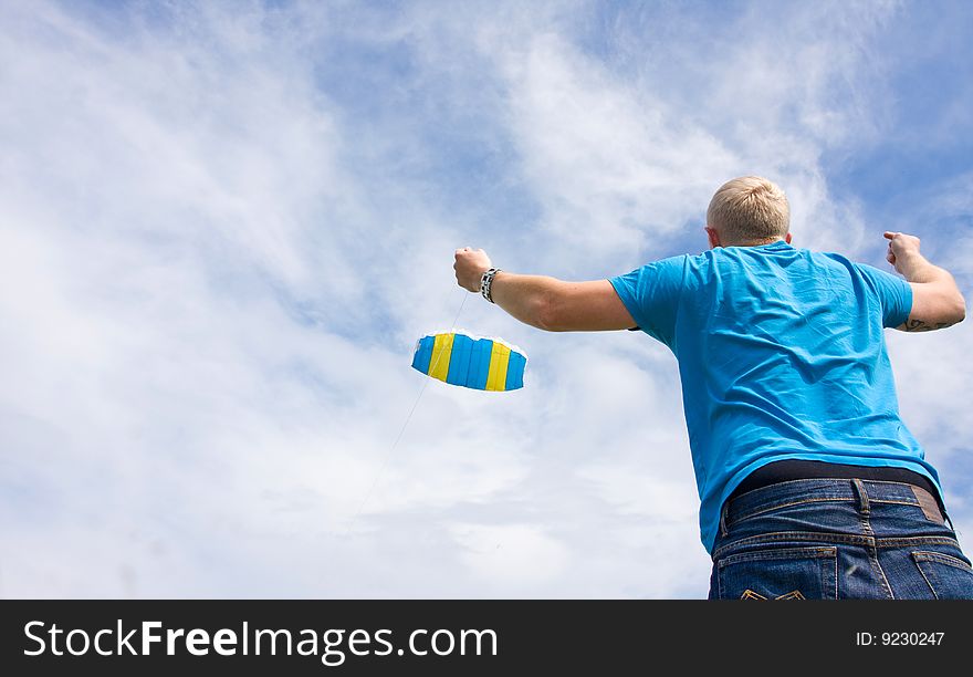 A man is trying to kite. A man is trying to kite.