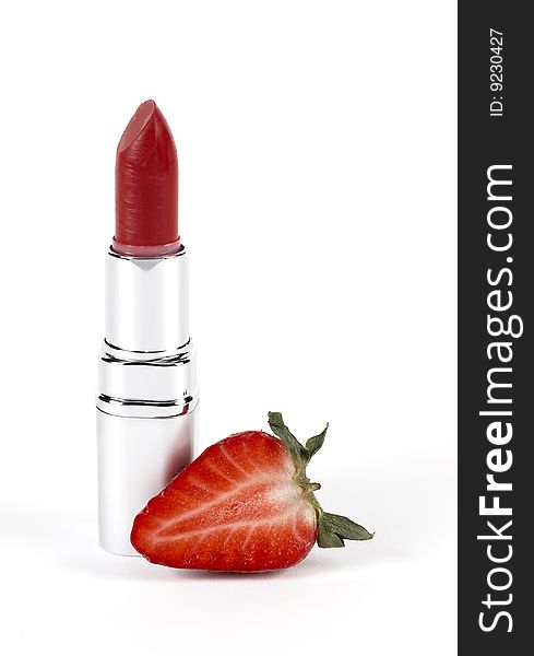 Lipstick strawberry flavored on a white background