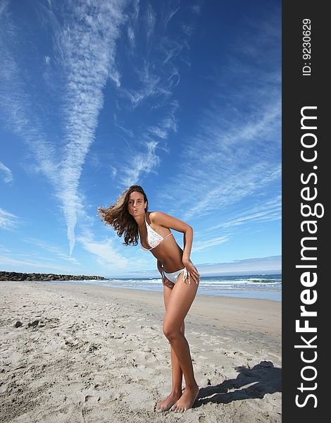 Beautiful girl posing in the beach. Beautiful girl posing in the beach