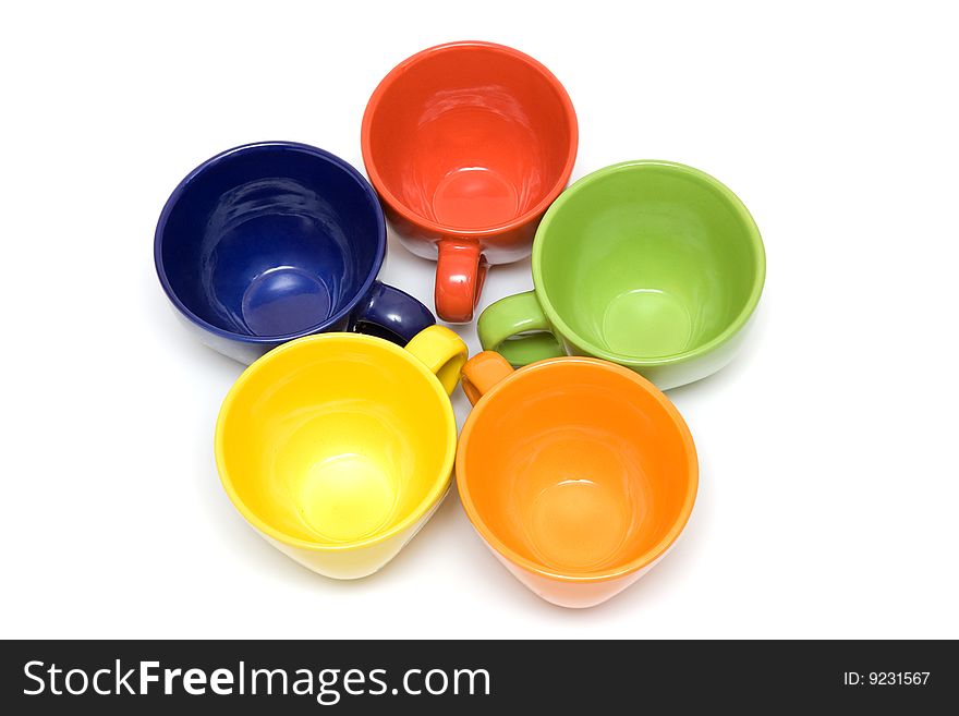 Multicolor cups on a white background