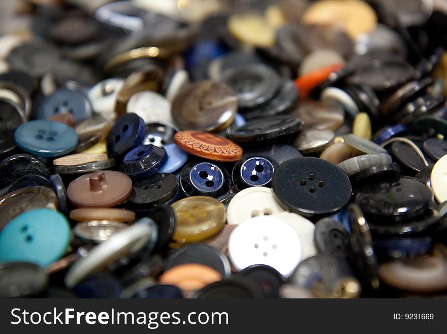 A group of buttons, filling up the frame with shallow depth of filed. Can be used as a background.